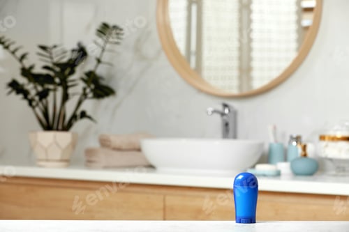 Preview: Stick deodorant on table in bathroom, space for text