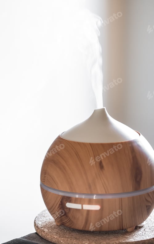 Preview: Modern oil aroma diffuser close up on a blurred background.