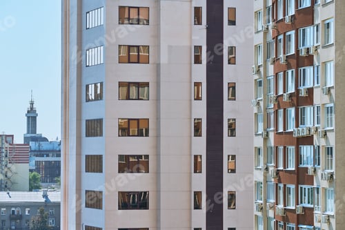 Preview: Facade of multistorey building with new modern apartments