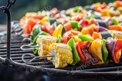 Preview: Homemade and fresh skewers on grill with meat and vegetables.