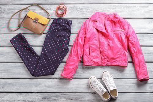 Preview: Pink jacket with dotted trousers.