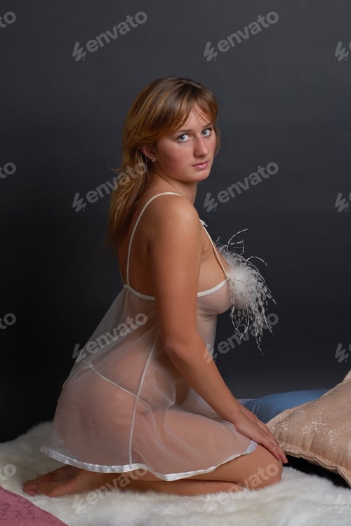 Preview: Sexy Plus Size Model Posing In Lingerie At Studio Over Black Background