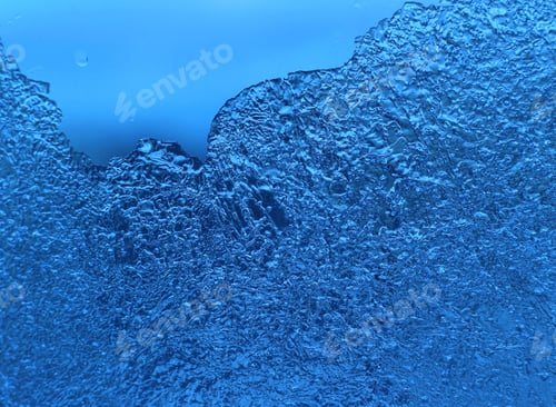 Preview: Ice pattern on glass, close-up natural blue texture