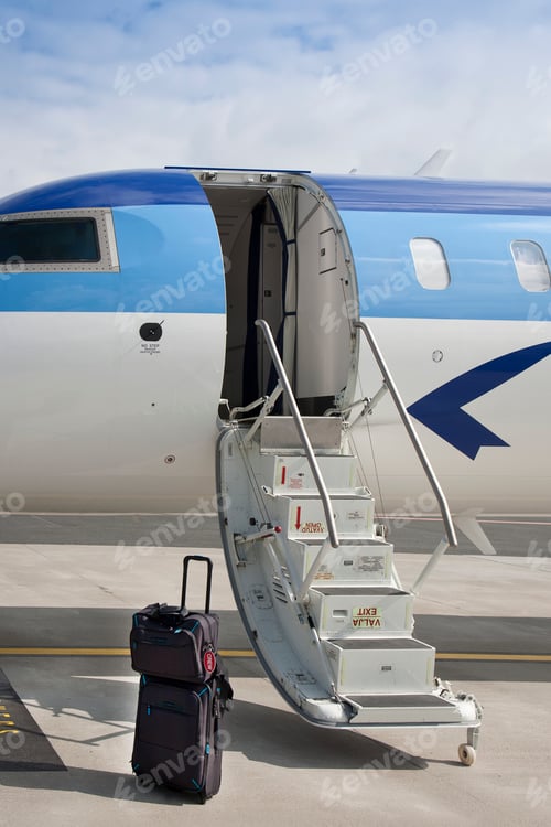 Preview: Luggage Near Airplane Steps
