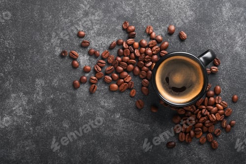 Preview: Coffee background. Measuring spoons with ground coffee, beans, cup and sweet chocolate truffles on o