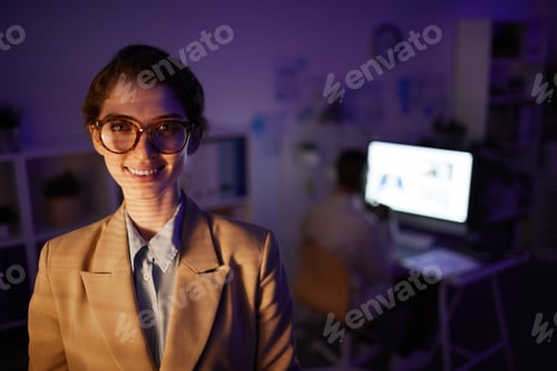 Preview: Cheerful Female Office Worker In Evening