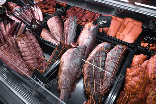 Preview: Showcase with different smoked fish in supermarket