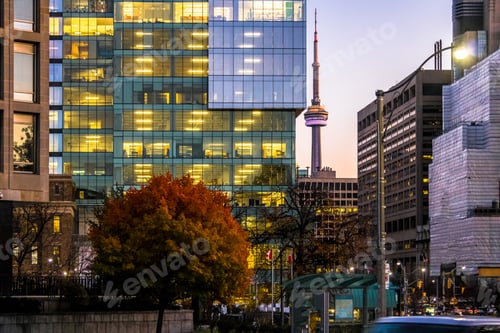 Preview: Colorful modern buildings of downtown Toronto and CN Tower at night - Toronto, Ontario, Canada