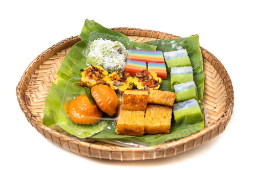 Preview: Assorted nyonya kueh on banana leaf rattan tray