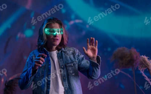 Preview: Metaverse digital cyber world technology, man with virtual reality VR goggles playing augmented