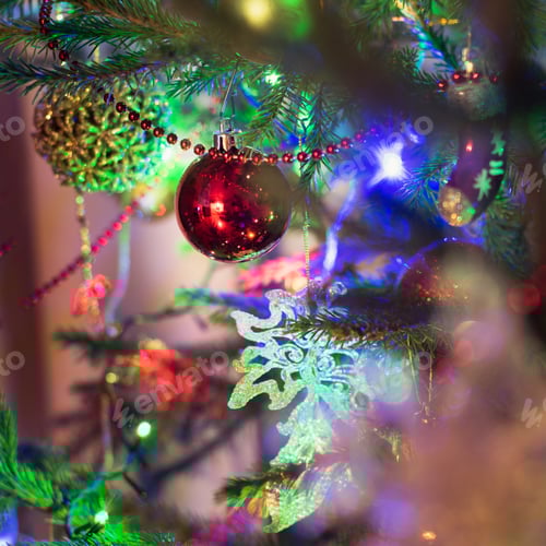 Preview: Christmas red balls on Christmas tree. Indoors. Close up.