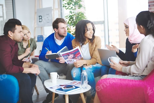 Preview: Photography of people discussing abot fashion magazine