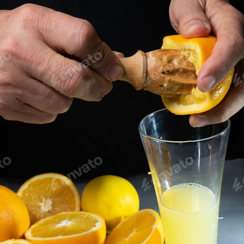 Preview: Squeezing fresh orange for juice