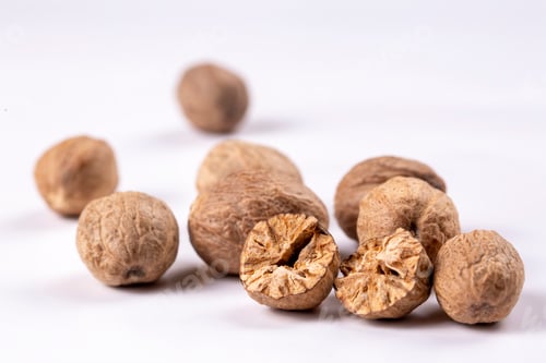 Preview: Nutmeg spice isolated on the white background