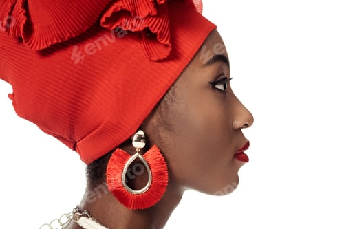 Preview: side view of young african american woman in wire head wrap isolated on white