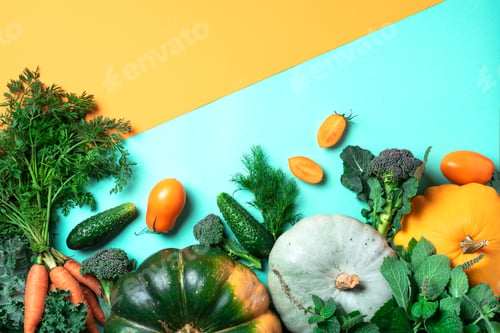 Preview: Vegan and vegetarian diet, harvest concept. Autumn vegetables on trendy yellow and green background
