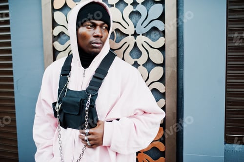 Preview: Stylish urban style african american man in pink hoodie