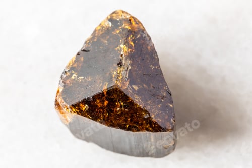 Preview: rough dravite tourmaline mineral on white