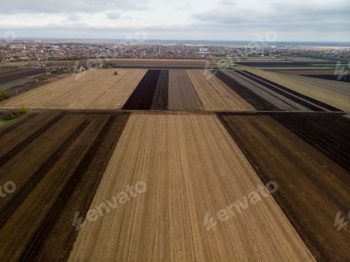 Preview: Aerial flight over Cultivated Agricultural fields in spring time