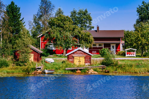 Preview: Aerial view of bridge across blue lake in summer landscape in Finland