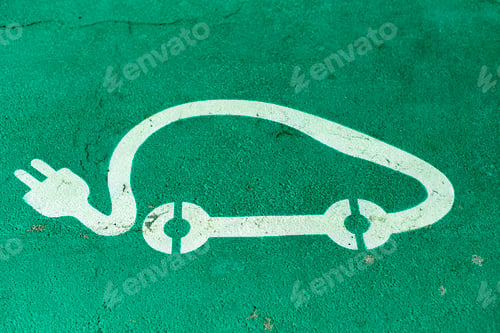 Preview: Car charging symbol painted on asphalt.