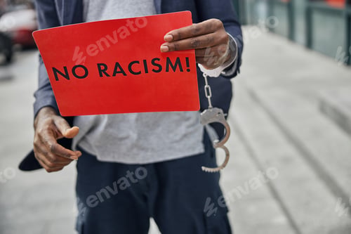 Preview: Close up of male hand holding paper sheet