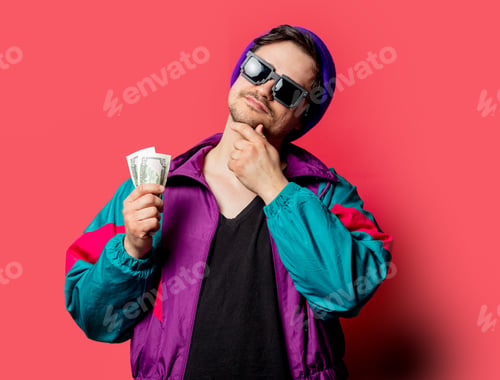 Preview: Funny guy in 80s style jacket and sunglasses hold money on red backgorund
