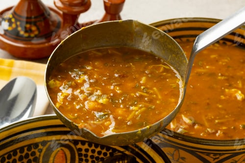 Preview: Serving Moroccan harira soup close up