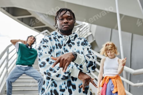 Preview: Group of young people dancing outdoors
