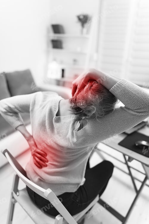 Preview: Woman Working On A Laptop And Having Hand, Back, Spine Pain.