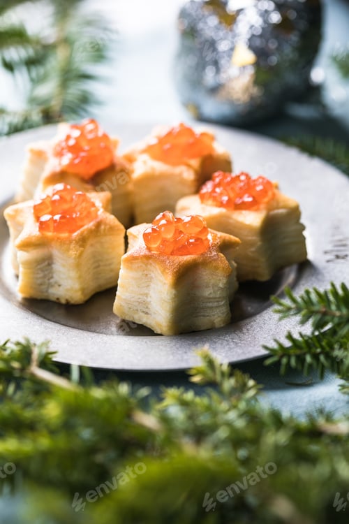 Preview: Christmas tree canape or sandwich with cucumber slice, salmon for festive x-mas snack. New year