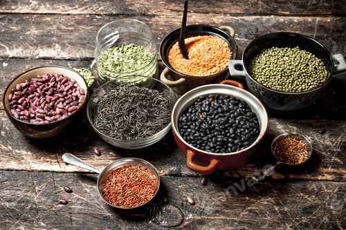 Preview: variety of bean seeds in a bowl . On a wooden table.