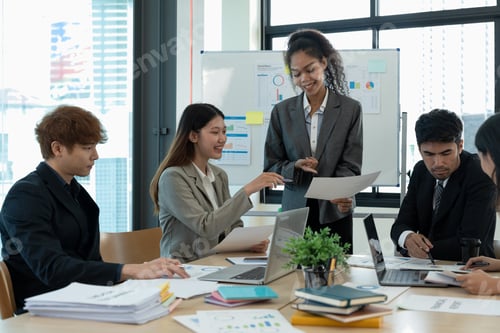 Preview: Diverse business people meeting new startup project pointing graph discussion and analysis data