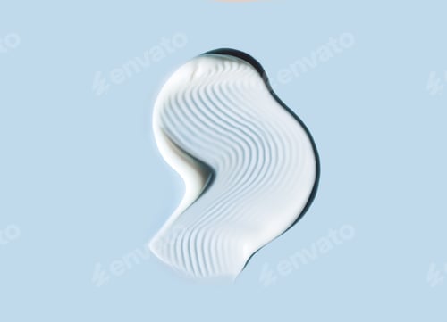 Preview: cosmetic smears of creamy texture on blue background