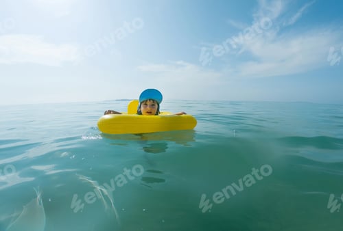 Preview: Kid swimming in rubber ring