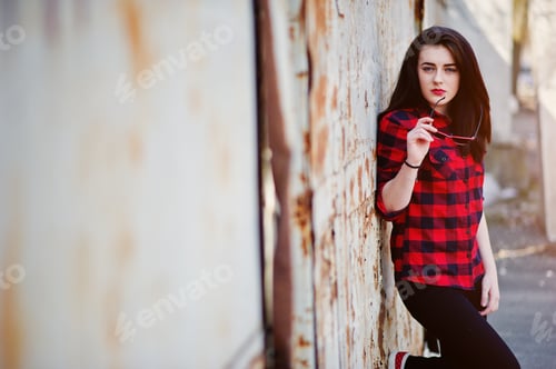 Preview: Portrait girl with red lips wearing a red checkered shirt