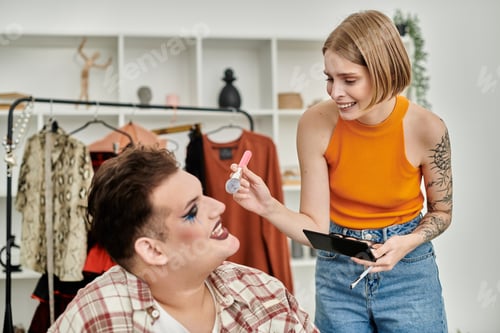 Preview: Stylish Queer Person Enjoying Makeup Session With Friend in Cozy Home Setting
