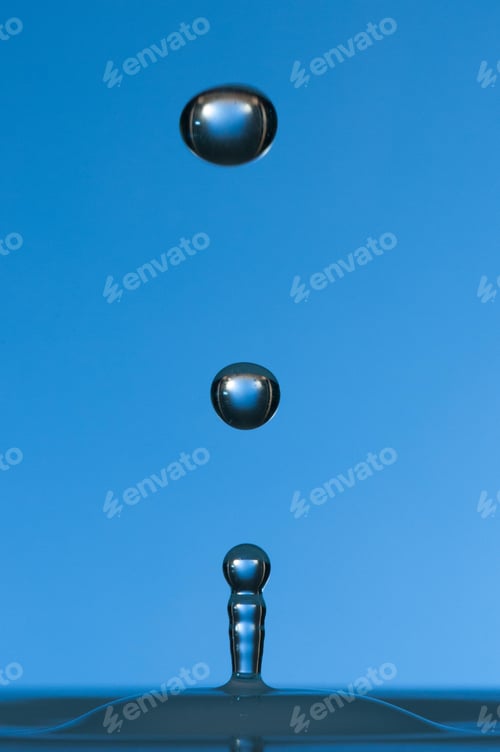 Preview: Splash of colorful liquid with high speed flash