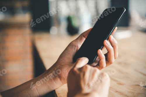 Preview: Asian business woman hand using and touching smart phone with white blank empty screen.
