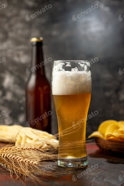 Preview: front view glass of bear with cips bottle and cheese on light background wine photo alcohol drink