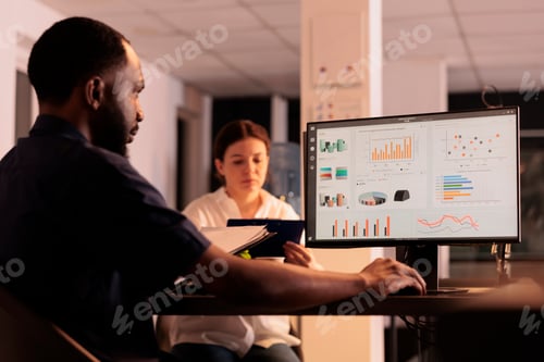 Preview: Financial analyst looking at company revenue report data