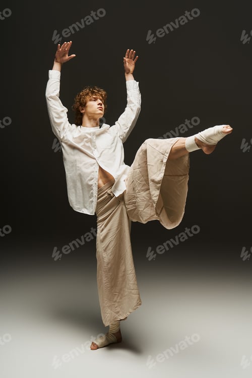 Preview: Dancer with curly hair expresses movement and art in a modern studio setting
