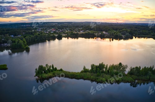 Preview: Lake near the forest and the city in the background