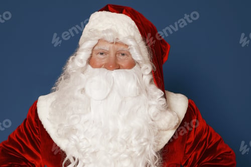 Preview: Happy authentic Santa Claus on blue background