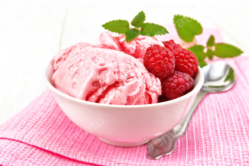 Preview: Ice cream crimson with mint in bowl on board