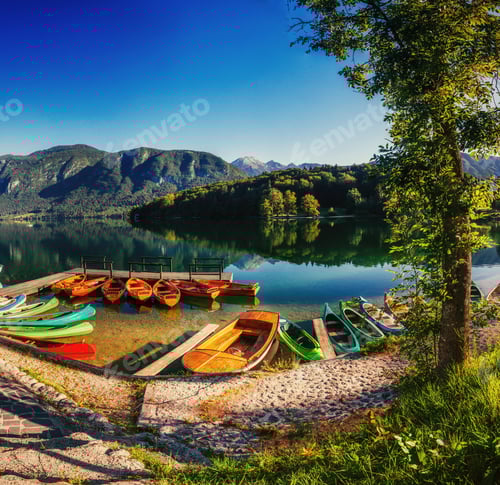Preview: Boat on the dock surrounded mountains. Fantastic Shtrbske Pleso
