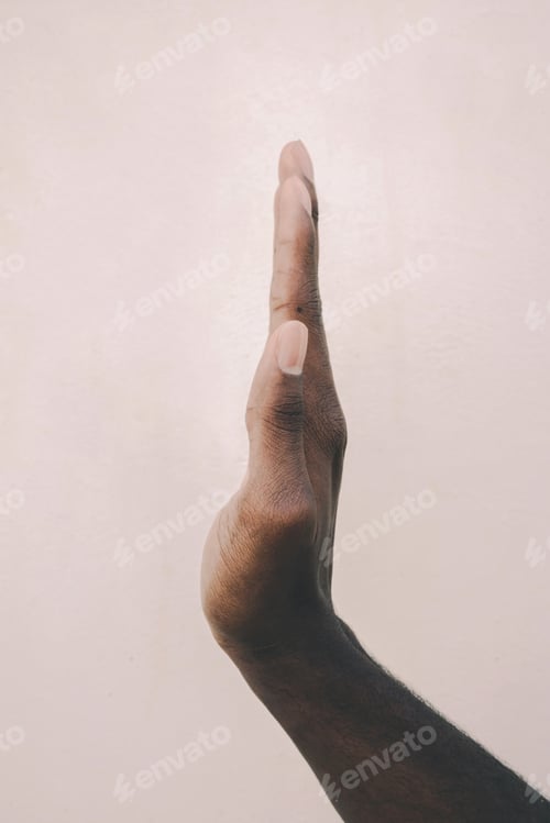 Preview: Dark skin hand held vertically