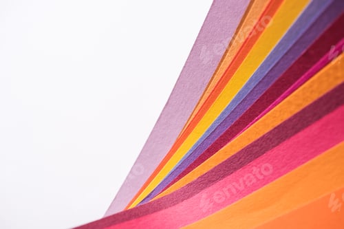 Preview: top view of colorful and bright papers isolated on white