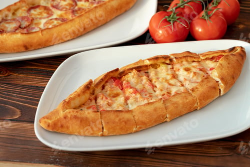 Preview: Close up of Turkish Pide bread on wooden table