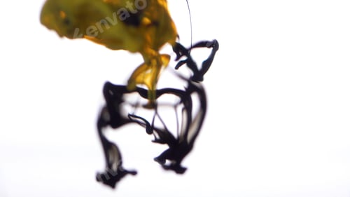 Preview: Close up for colored ink spreading in water on white background. Colorful, yellow abstract smoke